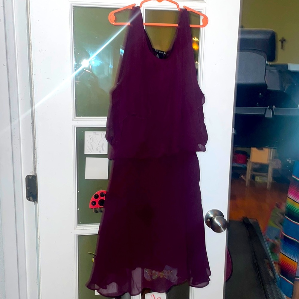 Maroon/Plum sleeveless dress.